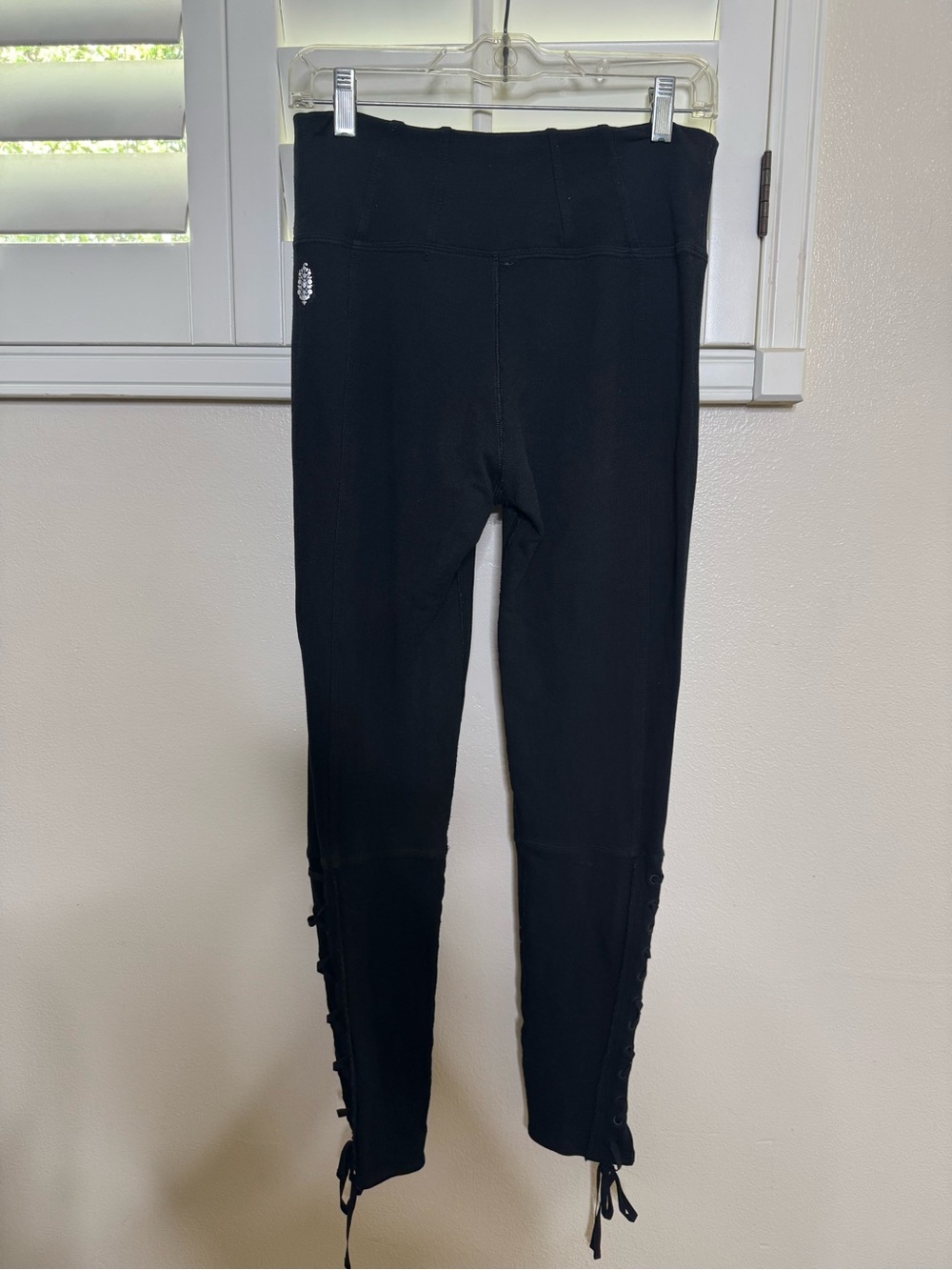 Free People athletic leggings featuring lace-up (has a small hole)